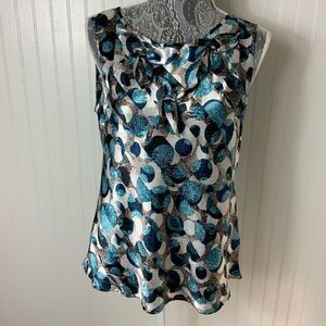 Quintessential sleeveless satin blouse